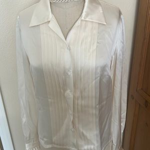 Talbots long sleeve silk cream blouse. Pleated front and cuffs.
